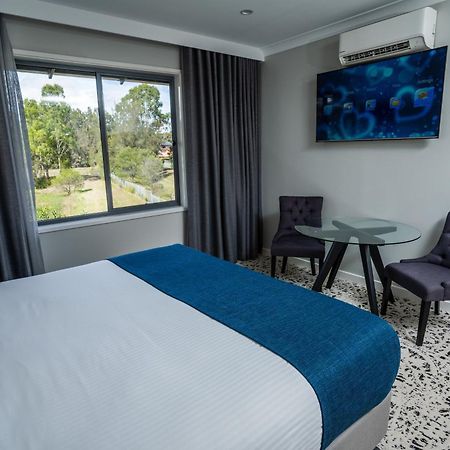 Warners At The Bay Motel Warners Bay Bagian luar foto
