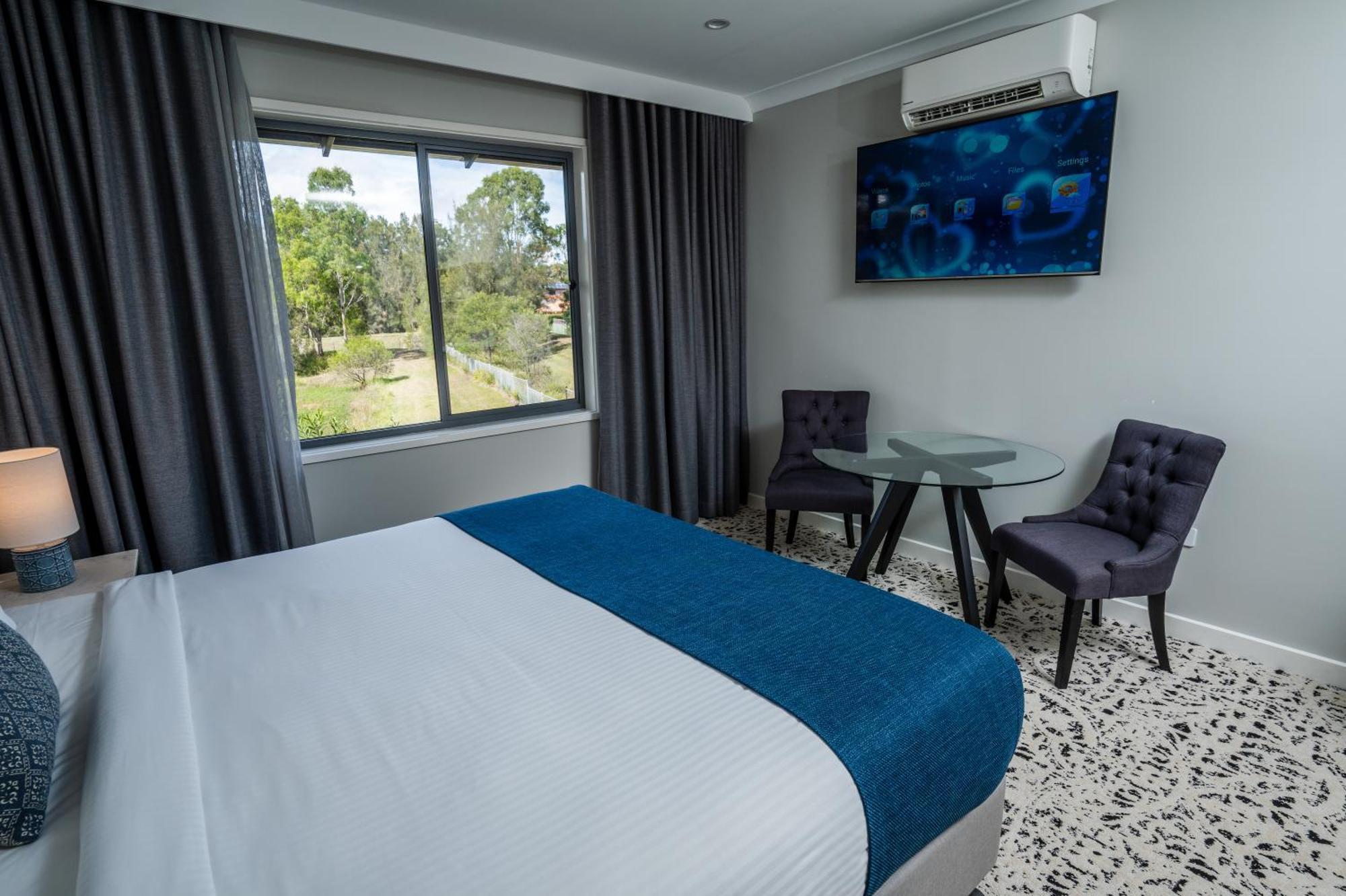 Warners At The Bay Motel Warners Bay Bagian luar foto
