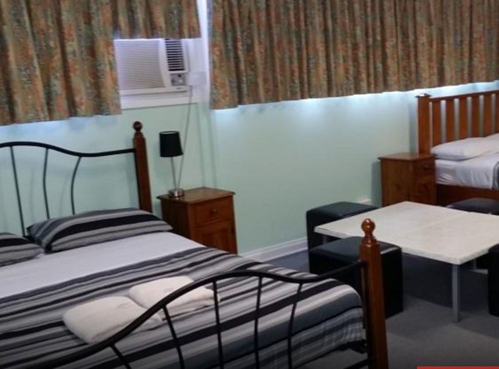 Warners At The Bay Motel Warners Bay Bagian luar foto